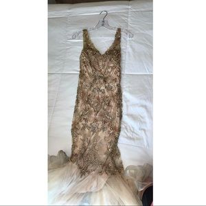 Size XS , a gold beaded long dress .